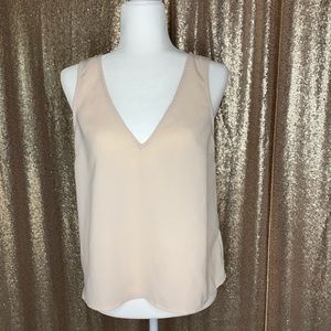 Pink sleeveless blouse